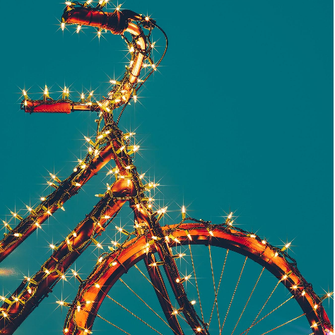 Bicycle Gift-Wrapped in Christmas Lights Bicycle Gift-Wrapped in Christmas Lights